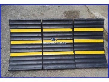 CỤC CHẶN BÁNH XE DI ĐỘNG - CỤC CHÈN BÁNH XE CAO SU 