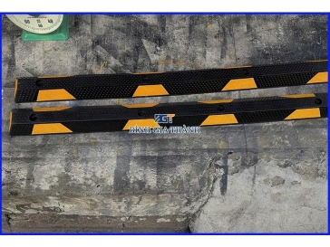 THIẾT BỊ CHẶN LÙI XE CAO SU ĐÚC